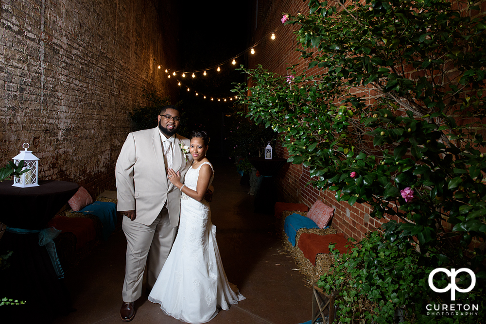 Bride and groom in the alley at the Bleckley Inn.