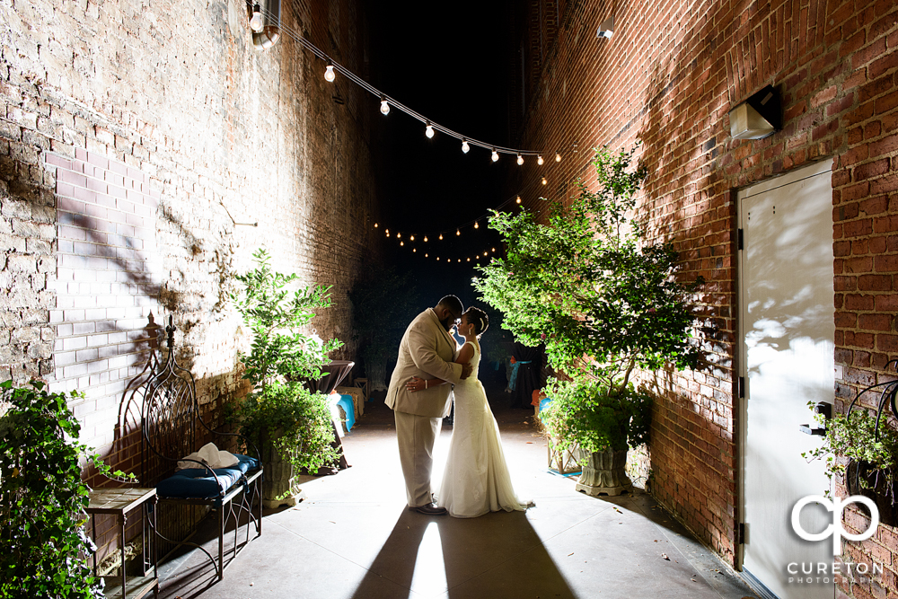 Epic pose of bride and groom after their Bleckley Inn wedding.