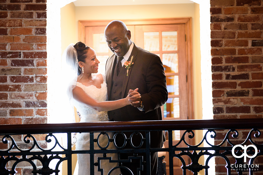 Bride and father dance.