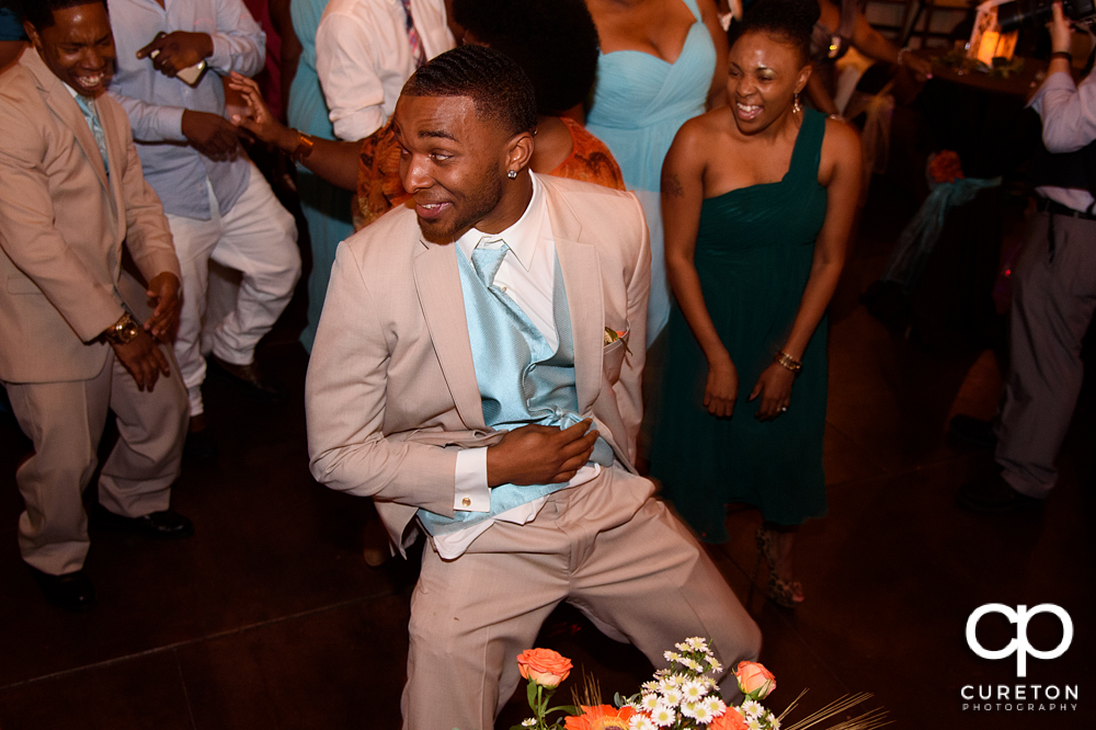 Wedding guests dance at the Bleckley Inn to the sounds of DJ Fresh.