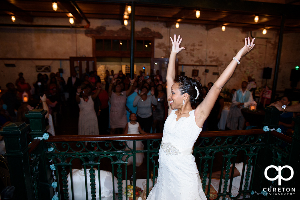 Bride tossing the bouquet.