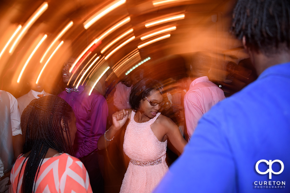 Wedding guests dance at the Bleckley Inn to the sounds of DJ Fresh.