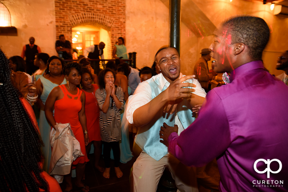 Wedding guests dance at the Bleckley Inn to the sounds of DJ Fresh.