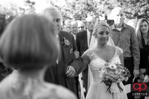 Bride getting emotional when she walks down the aisle.
