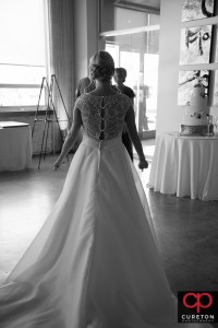 Bride walks toward her father for a first look.