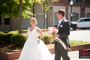 Bride and groom on main street Greenvile.
