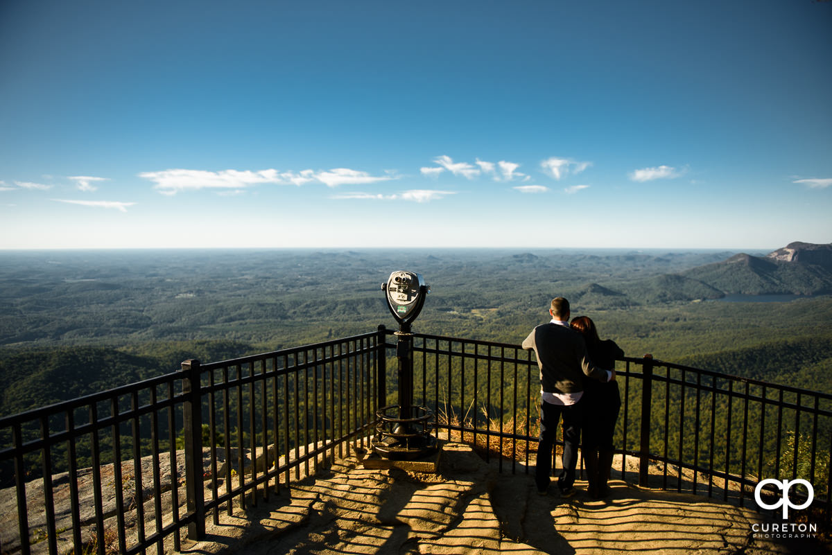 Engaged couple at the Caesar's Head overlook.