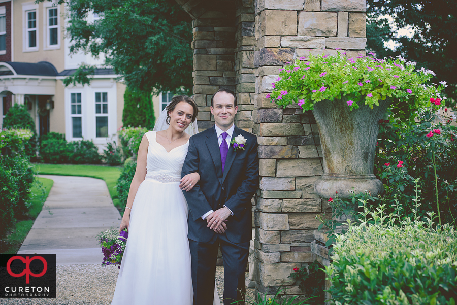 Bride and Groom in a garden after their Charlotte,NC wedding.