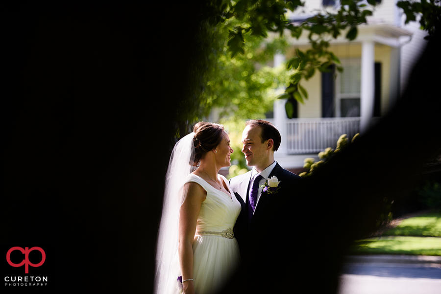 Married couple walking in the park.