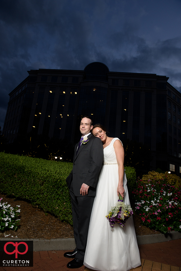 Bride and groom at sunset in the city.