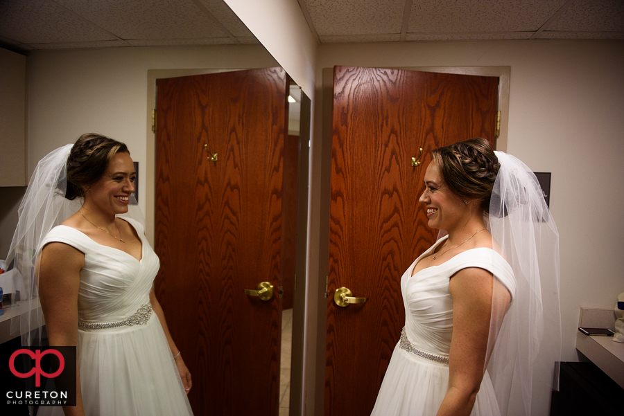 Bride getting ready at the church.