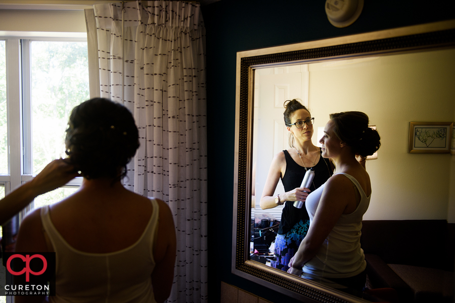 Bridal makeup being applied.