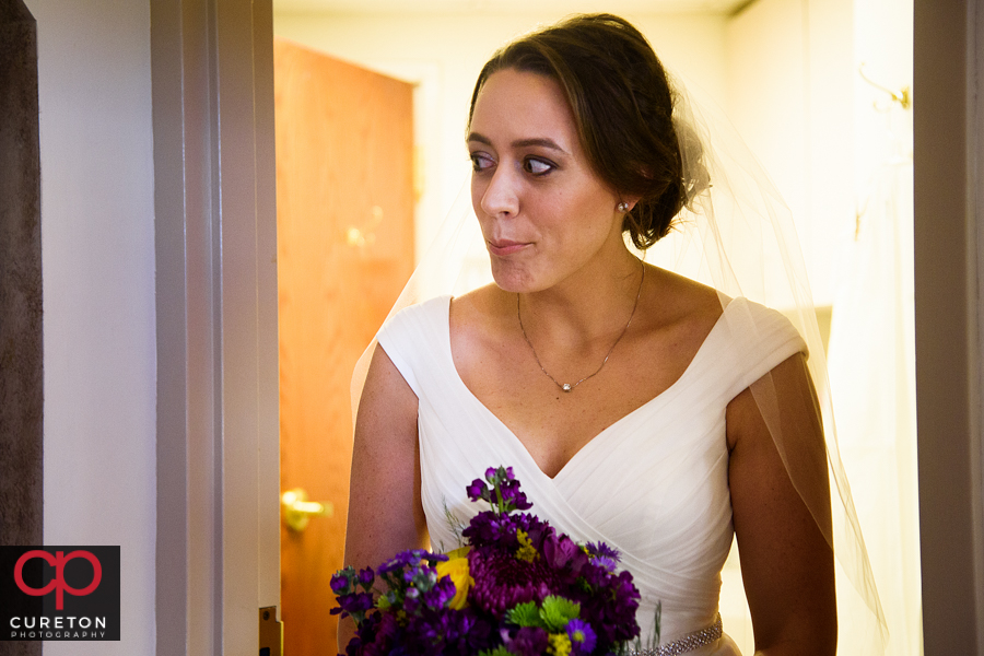 Bride before her wedding at St. Matthew Catholic church in Charlotte NC.