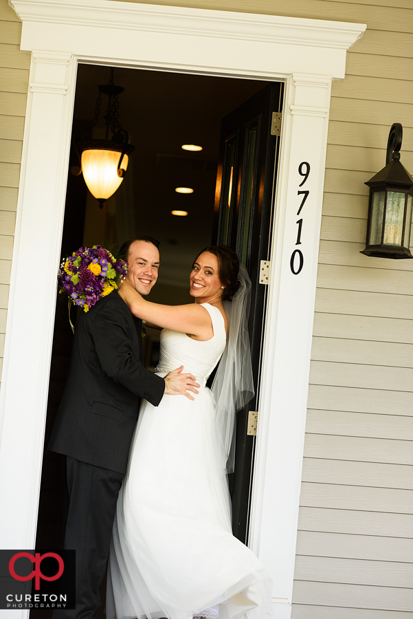 Bride and groom at their house.