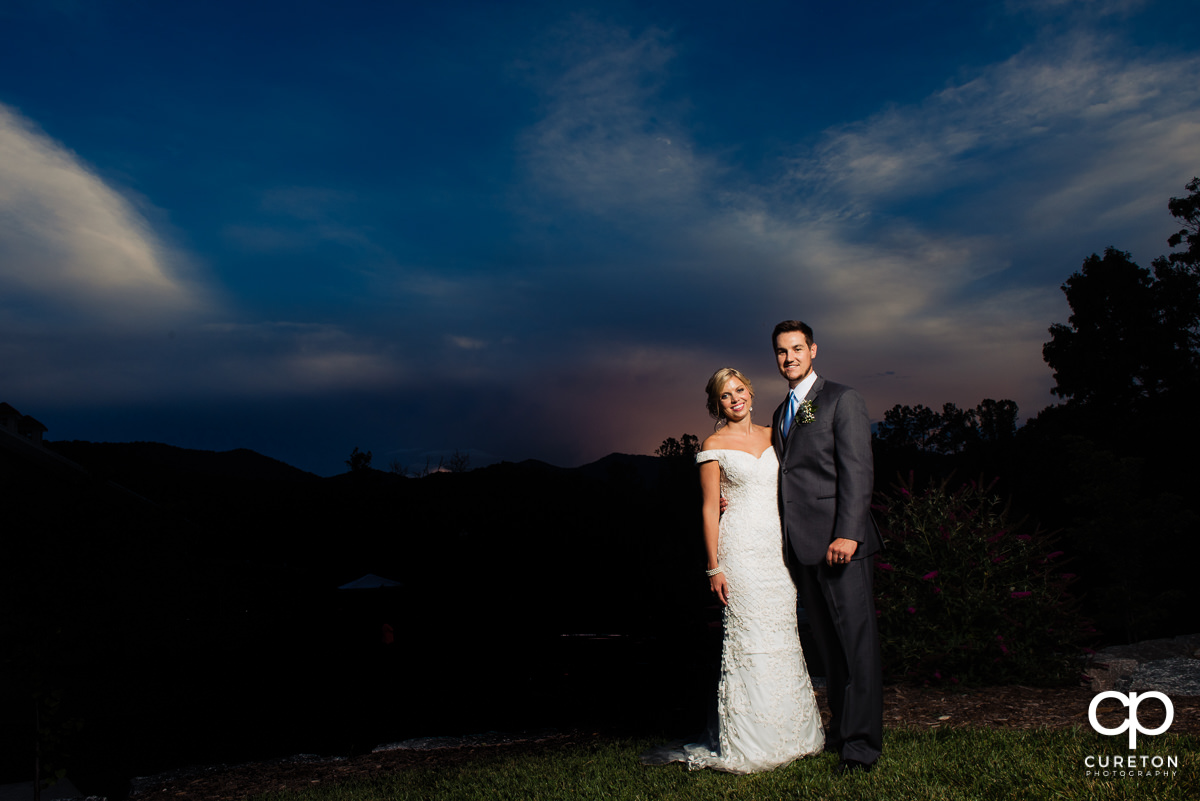 Bride and groom at sunset after their Chestnut Ridge wedding.