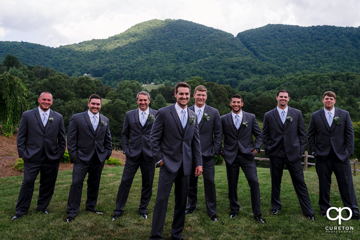 Groom and his groomsmen in front of a mountain view at Chestnut Ridge.