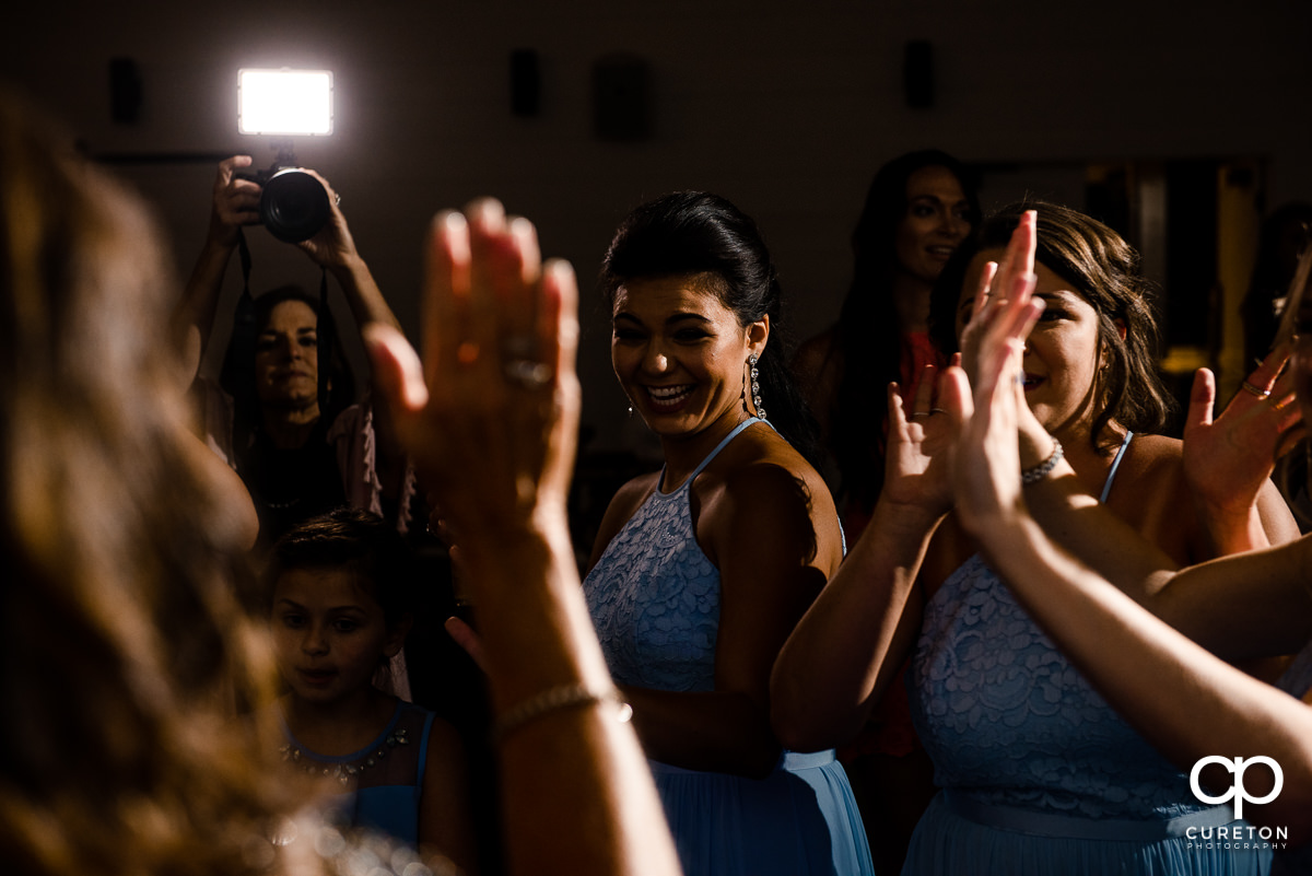 Wedding guests dancing at the Chestnut Ridge reception.