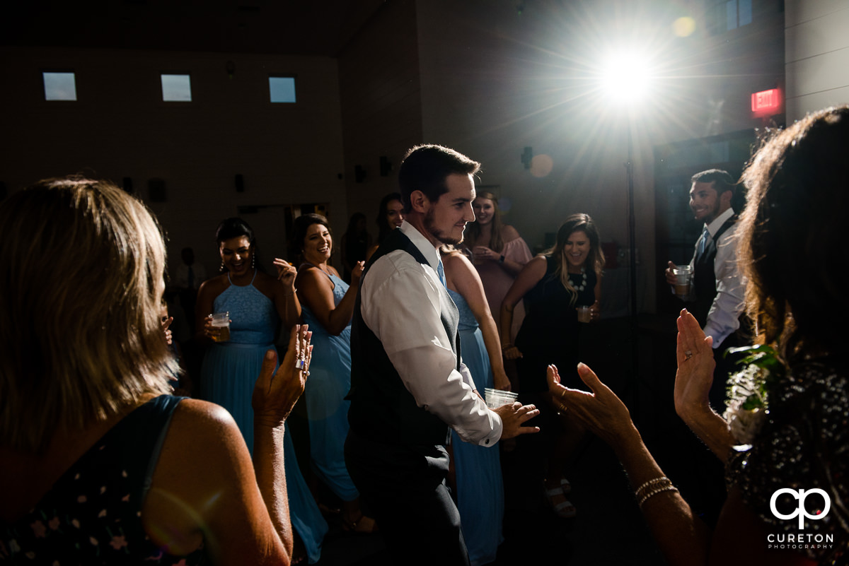 Wedding guests dancing at the Chestnut Ridge reception.