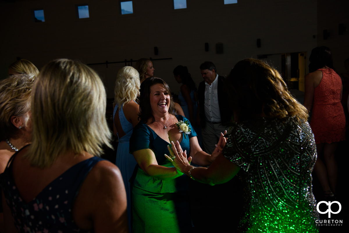 Wedding guests dancing at the Chestnut Ridge reception.
