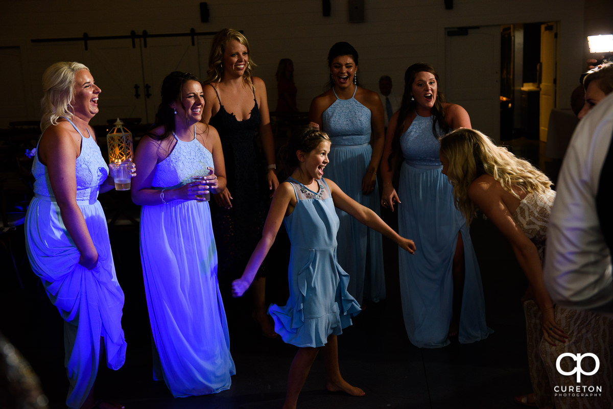 The flower girls dancing at the Chestnut Ridge reception.