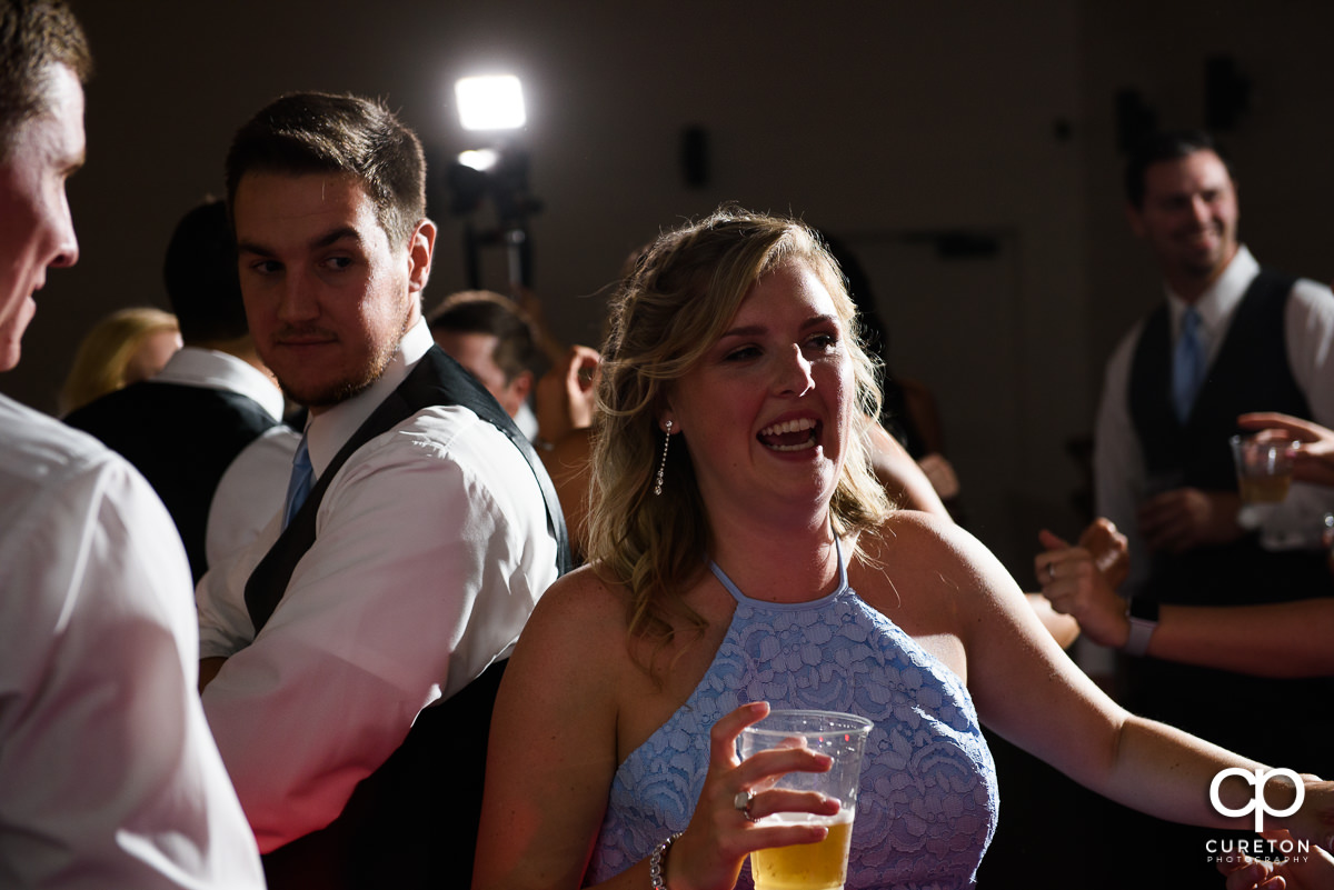 Wedding guests dancing.