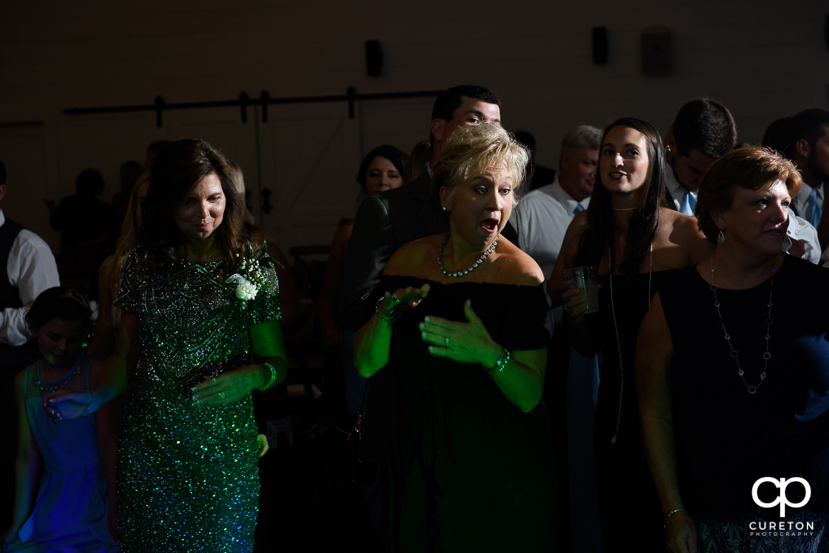 Wedding guests dancing.