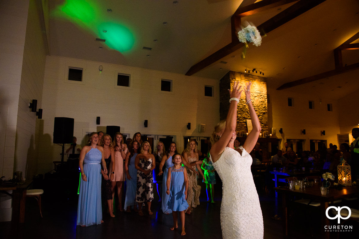 Bride tossing the bouquet.