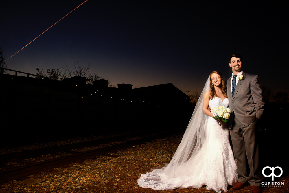 Bride and groom at sunset.