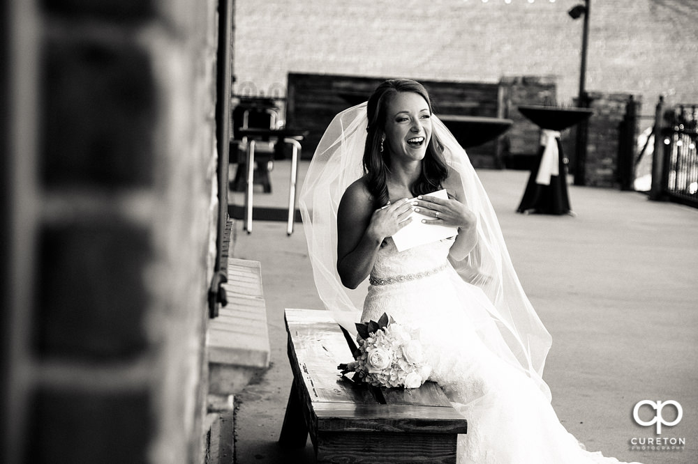 Bride laughing.