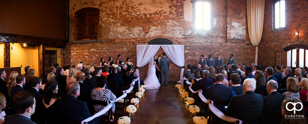 Wedding ceremony at Old Cigar Warehouse.