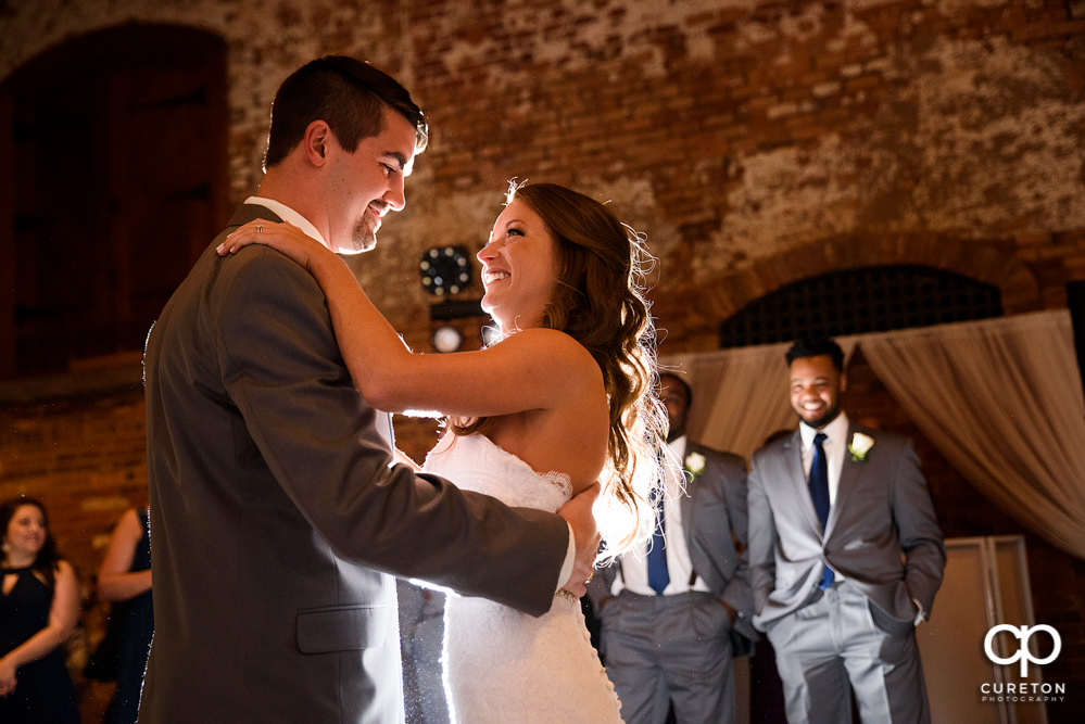 Bride and groom first dance at their wedding reception.