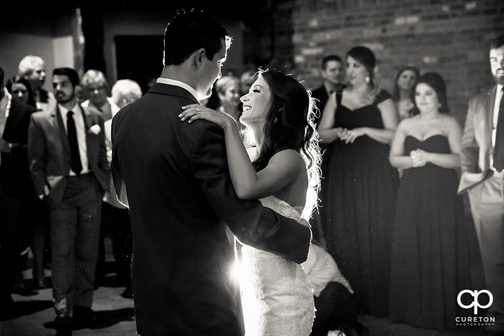Bride and groom first dance at their wedding reception.