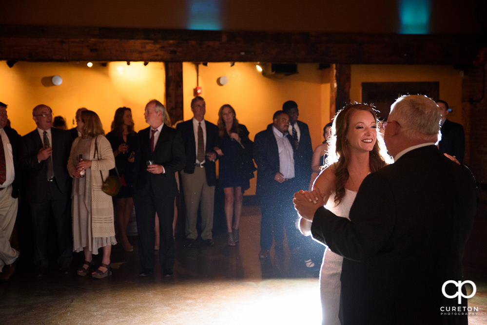 Bride and father dance.
