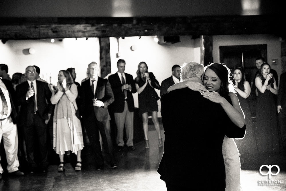 Bride and father dance.
