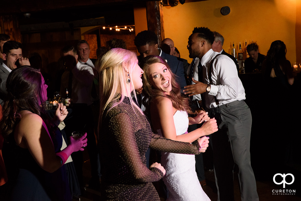 Guests dancing at the wedding reception to the sounds of Uptown Entertainment.