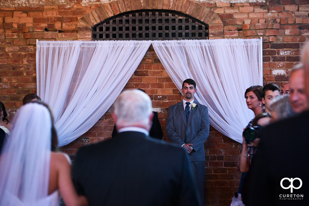 Groom's reaction.