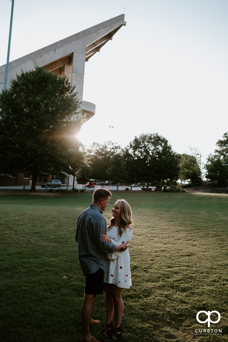 Engaged couple outside the stadium in Clemson.