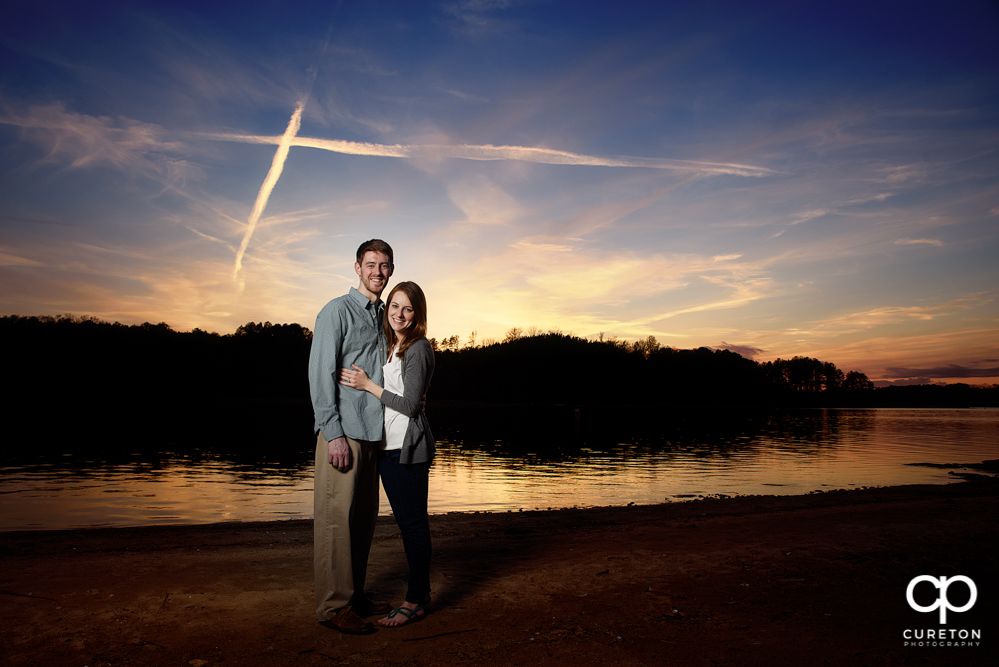 Sunset engagement session by the lake in Clemson SC.