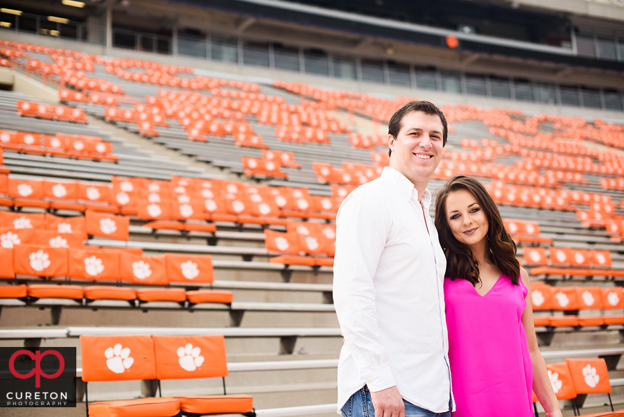 Future bride and groom in the stadium at CLemson.