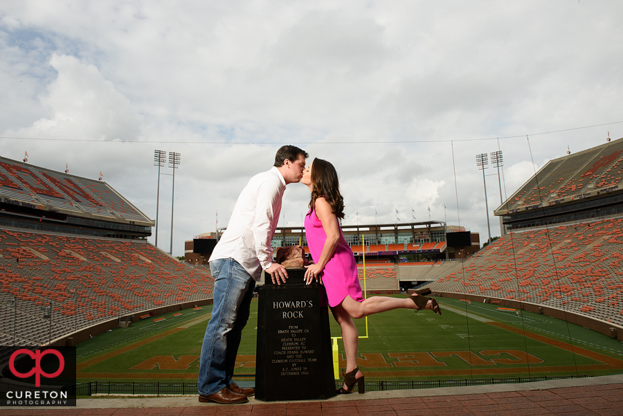 Clemson themed engagement session in the stadium with Howard;s rock.