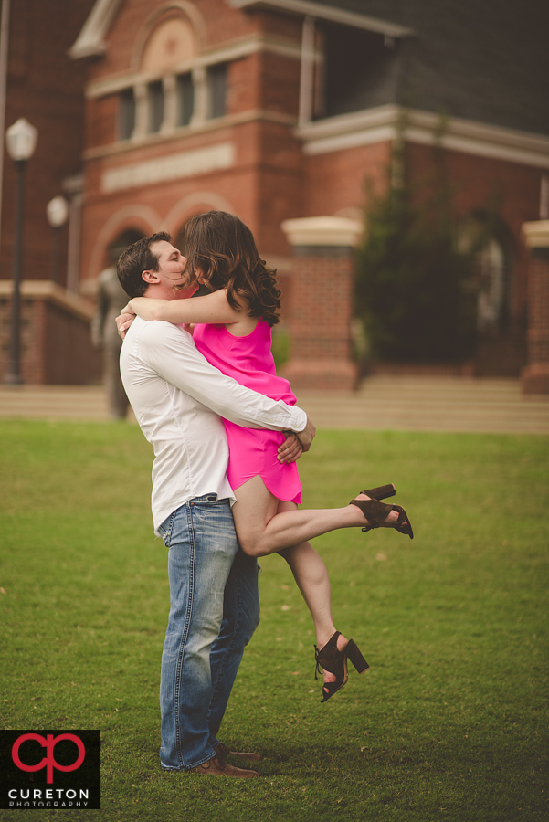 Future bride and groom on Bowman Field.