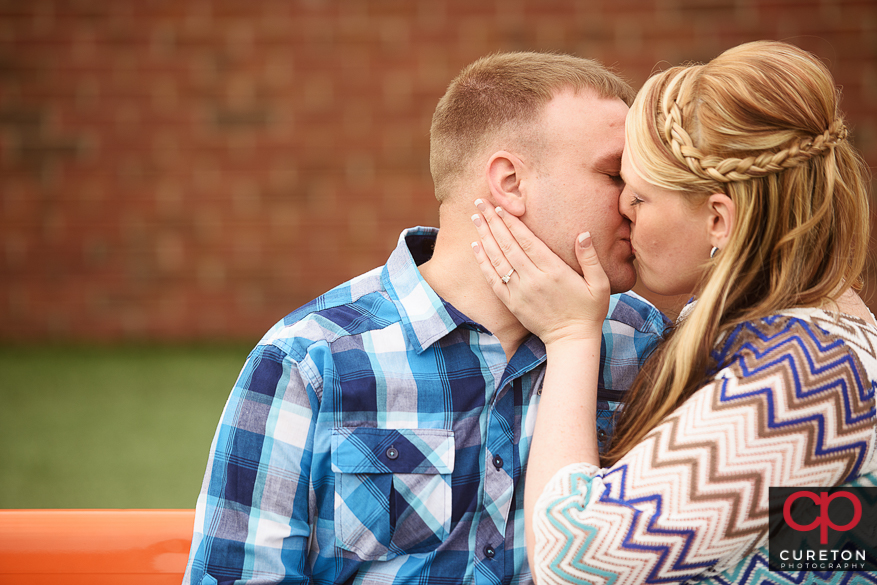 Engaged couple during a session on the Clemson University campus.