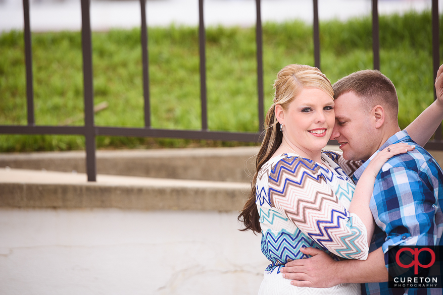 Engaged couple during a session on the Clemson University campus.