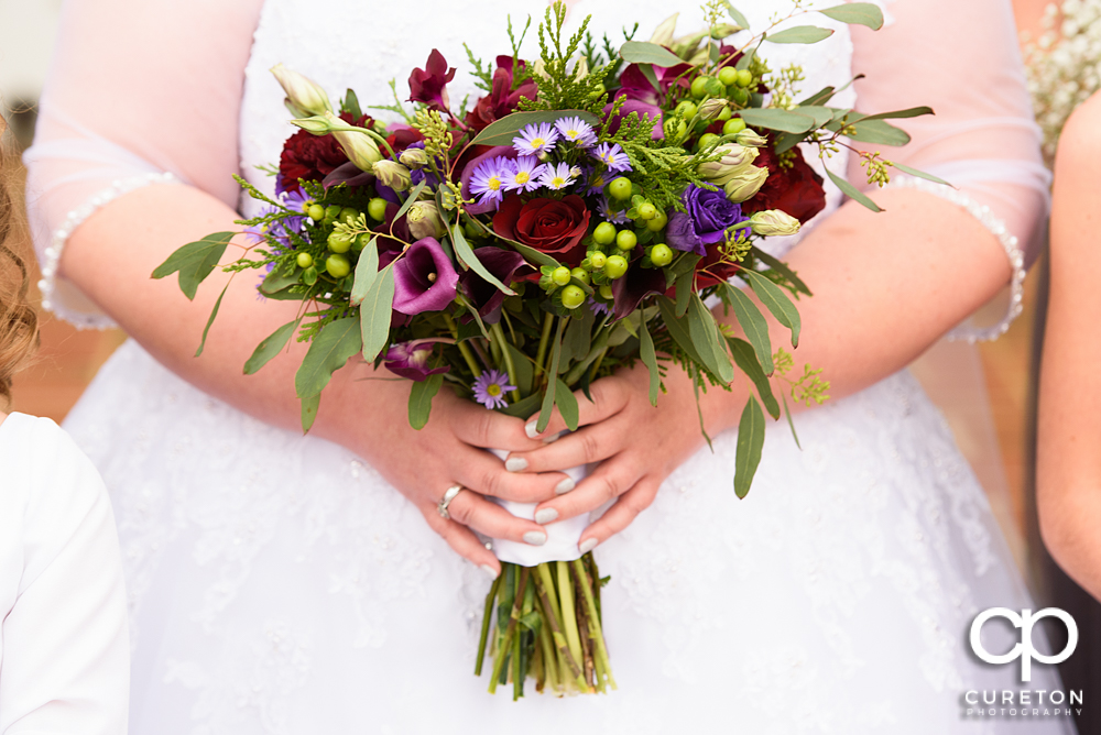 Brides amazing bouquet by Greg Foster.