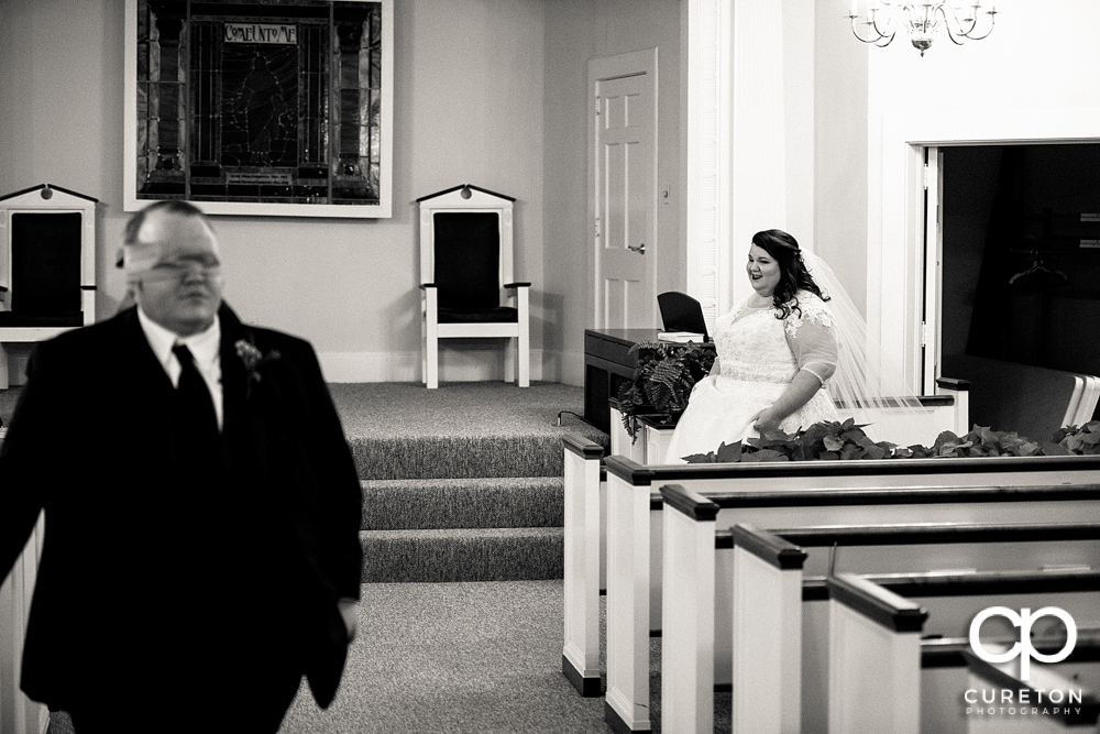 Bride walking up n her first touch with the groom.