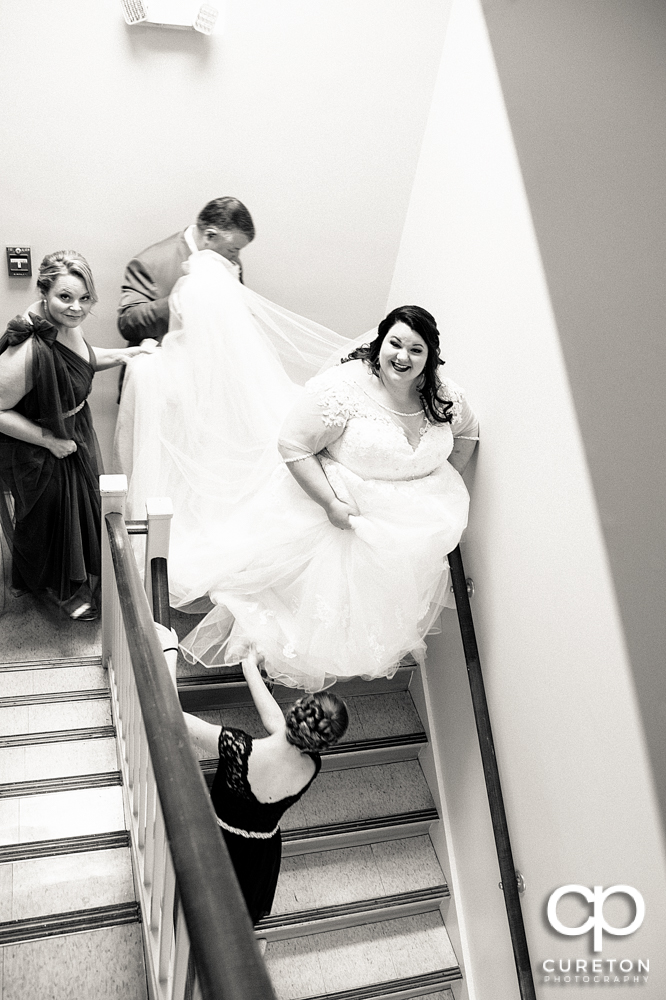 Bride walking down the steps to the ceremony.