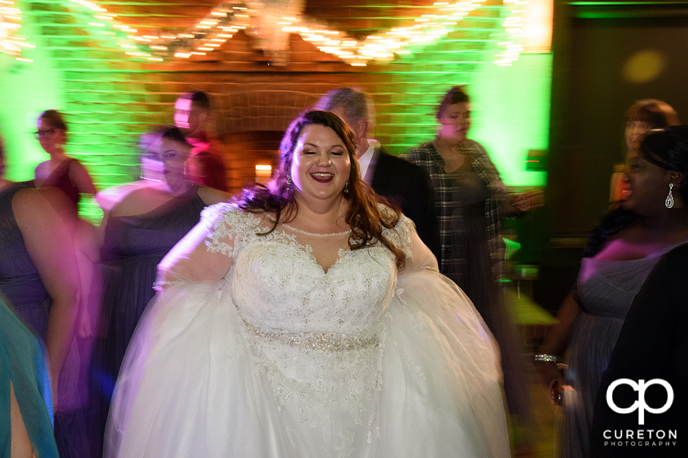 Bride dancing at her reception.