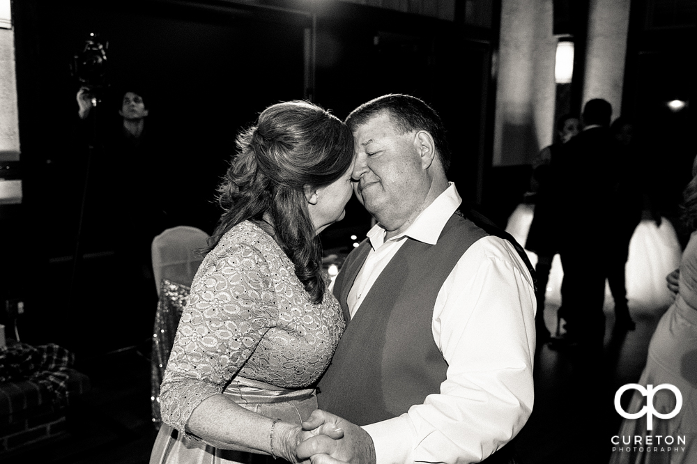 Parents of the bride dancing.