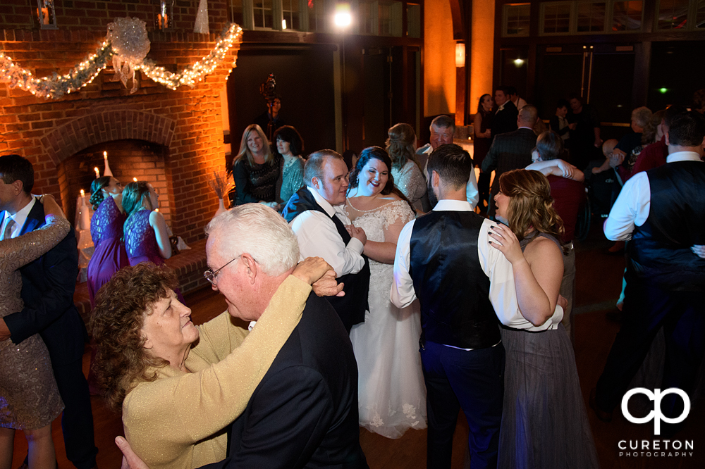 Wedding guests dancing to the sounds of Greenville wedding dj Uptown Entertainment.