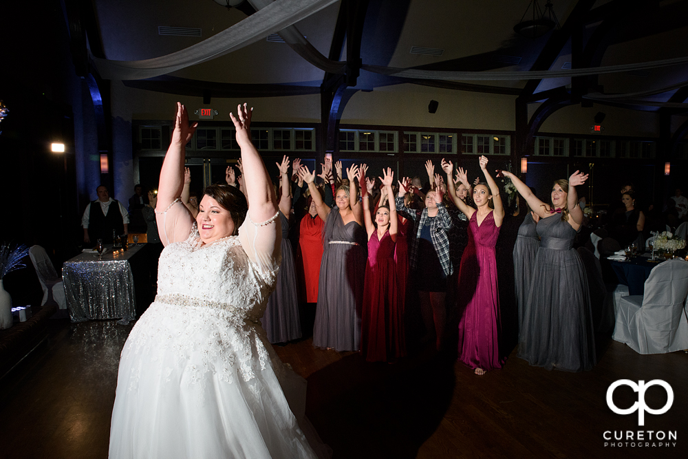 Bride tossing the bouquet.